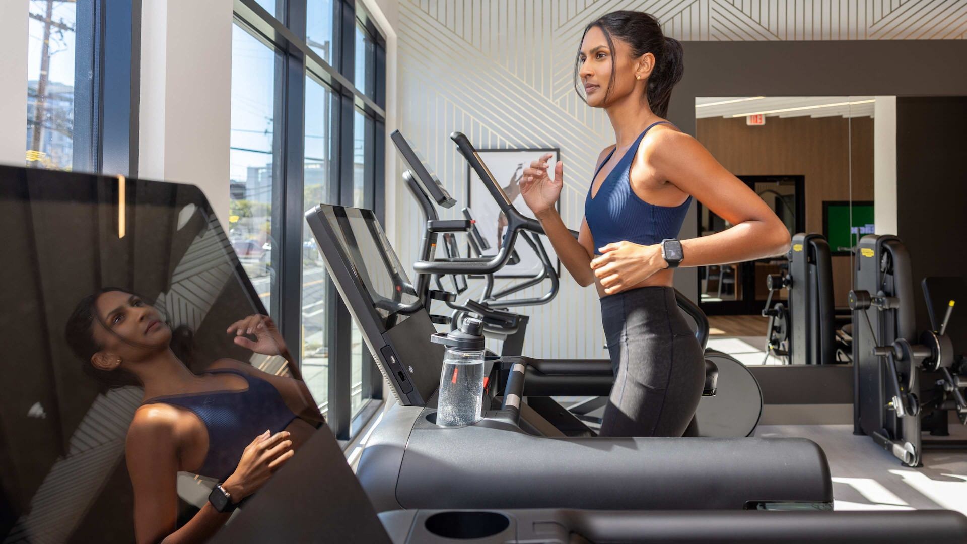 Large fitness center with large windows 